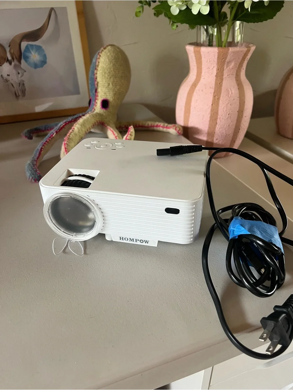 HOMP0W White Portable Mini Projector - Compact LED Home Theater